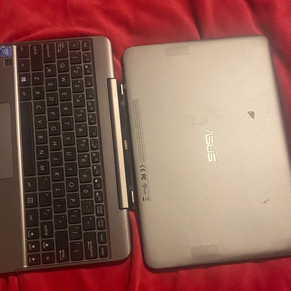 ASUS Gray Laptop with Black Keyboard